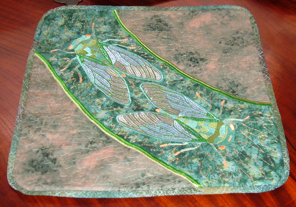 Cicada 1 - embroidered cushion