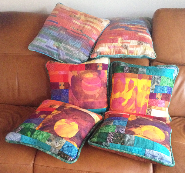 Pieced and appliqued cushions